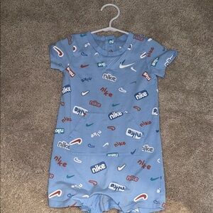 Nike Kids Blue Bodysuit with Multicolor Logos